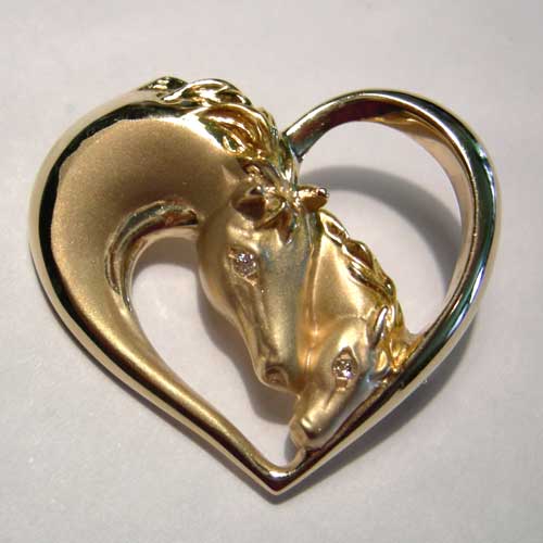 gold mare and foal heads inside heart brooch/pendant