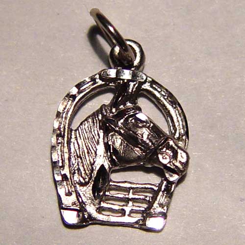 white gold horse head behind fence pendant
