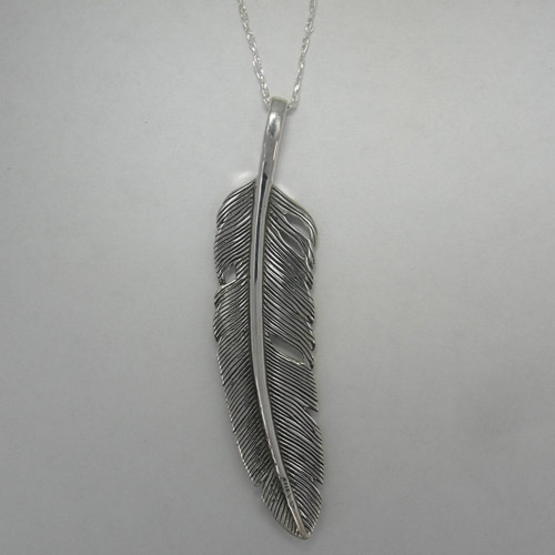 backside of Sterling Silver reversivble Turquoise feather necklace