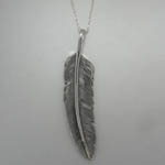 backside of Sterling Silver reversivble Turquoise feather necklace