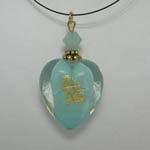 back side of Venetian Glass Clear and Blue Pacific Opal heart on nylon cord