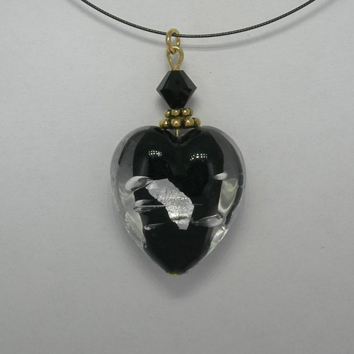 Venetian Glass back side of clear and black and silver heart on nylon cord 