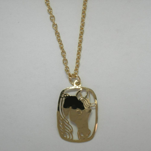 Close up of Arabian Horse Head pendant of necklace