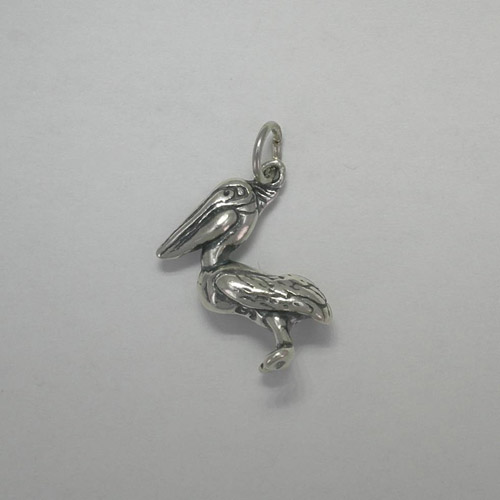 Left side of Sterling Silver 3 D Pelican charm pendant