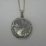 backside of 3 D Sterling Silver Sand Dollar necklace