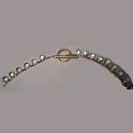 Clasp of gold plated White Topaz bead necklace