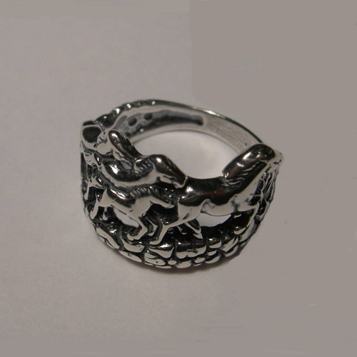 side view of galloping horses ring