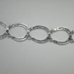 close up of horseshoe link bracelet