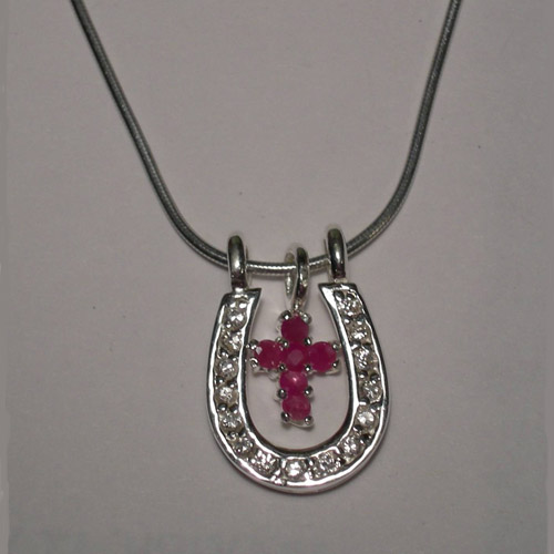 Sterling Silver ruby cross inside horseshoe necklace