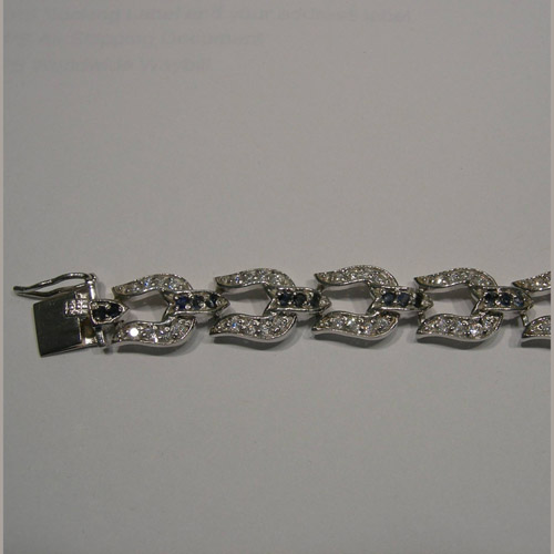 Tongue clasp of sapphire and Cubic Zirconia horseshoe bracelet