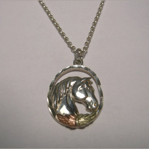 Black Hills Gold Sterling Silver horse head in oval necklace