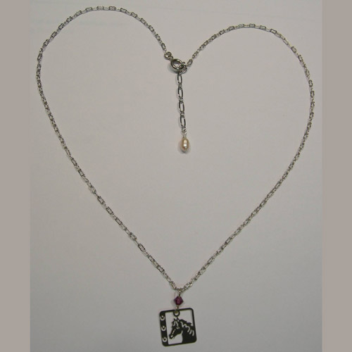 different view of horse head and horseshoe necklace