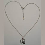 different view of horse head and horseshoe necklace