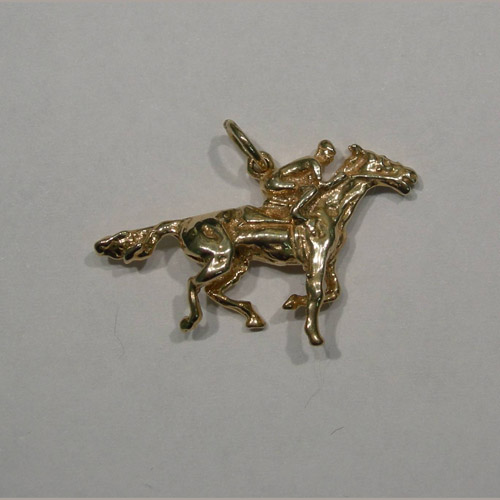 14 karat yellow gold race horse and jockey pendant