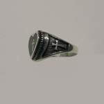 side view of cross in heart ring