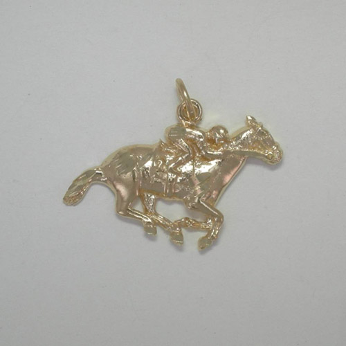14 karat yellow gold Thoroughbred and jockey pendant