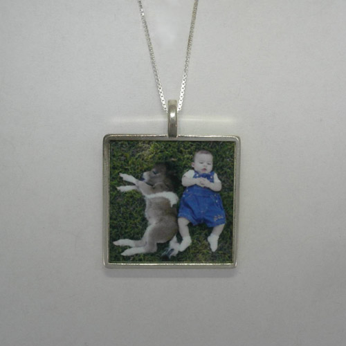 opposite side of large Sterling Silver photo necklace