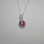 opposite side of Sterling Silver reversible horseshoe necklace