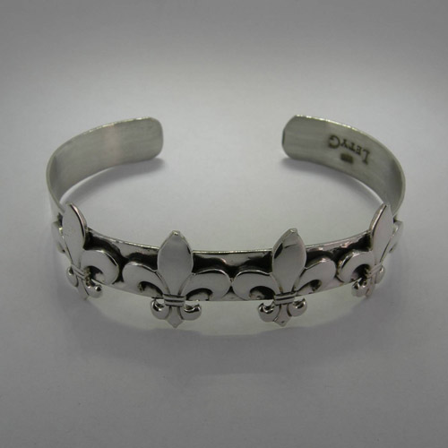 different angle of fleur de lis cuff bracelet