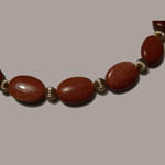close up of 14 kt.y.g. Goldstone bead necklace