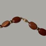 clasp of 14 kt.y.g. Goldstone bead necklace